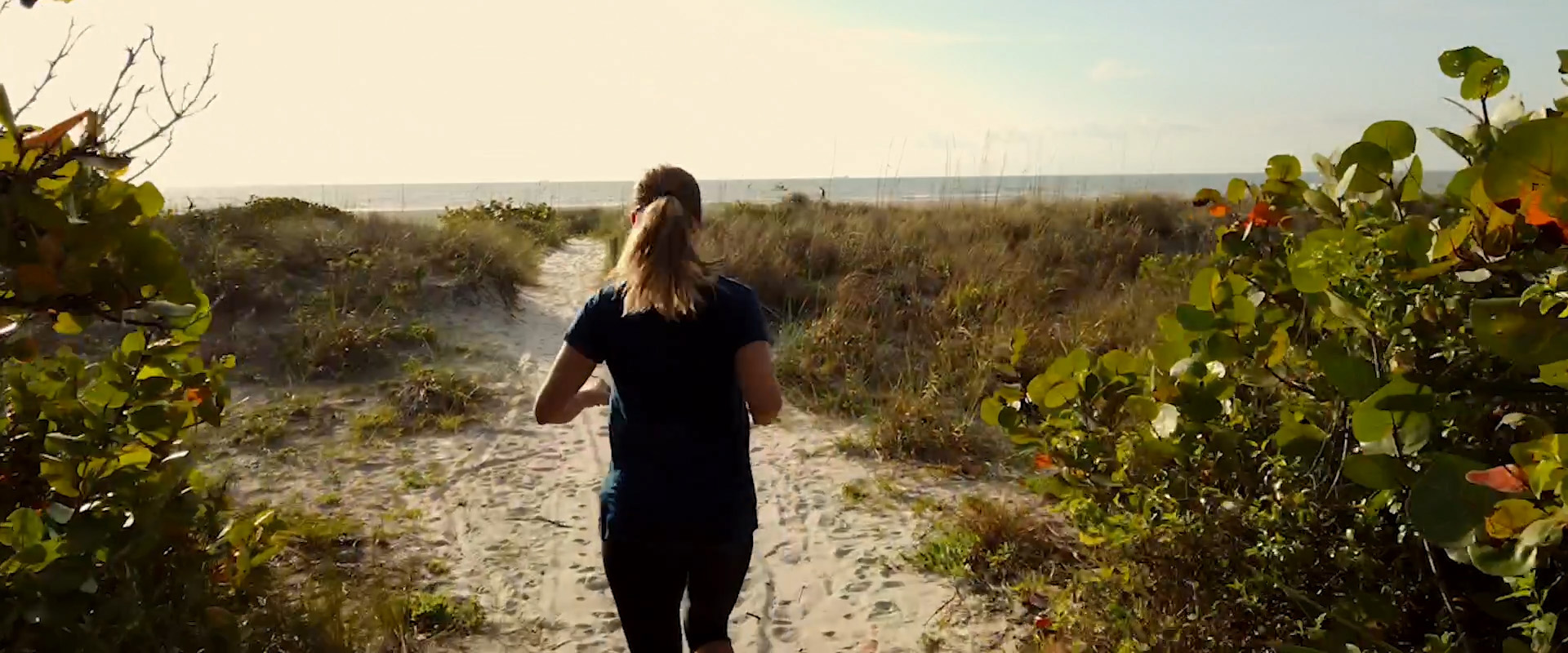 Woman running on the beach